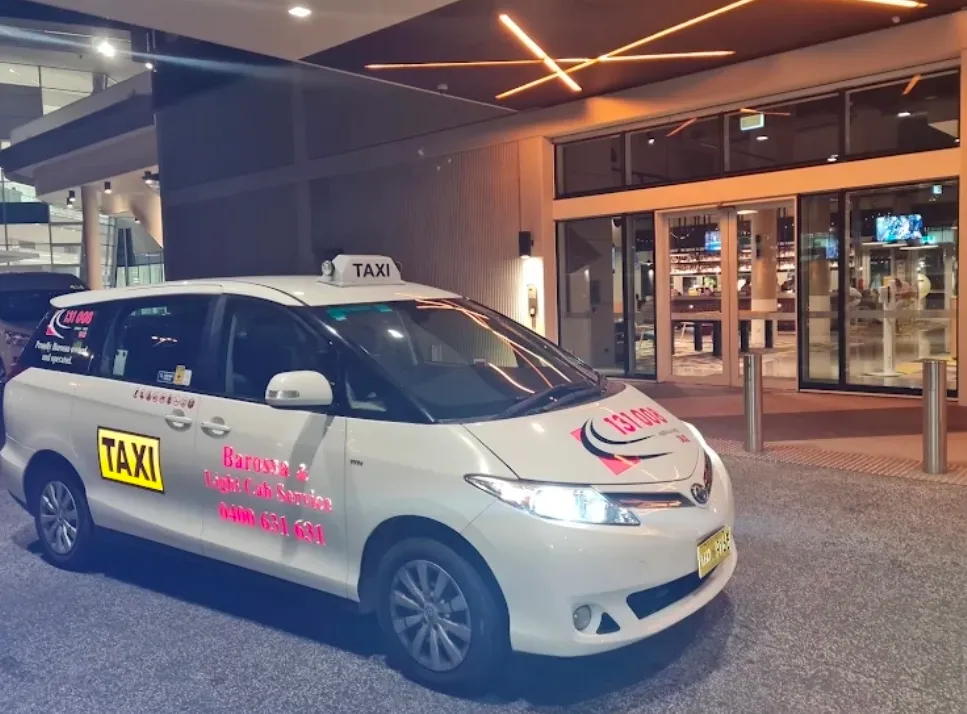 Barossa & Light Cab Service taxi at Adelaide Airport at night