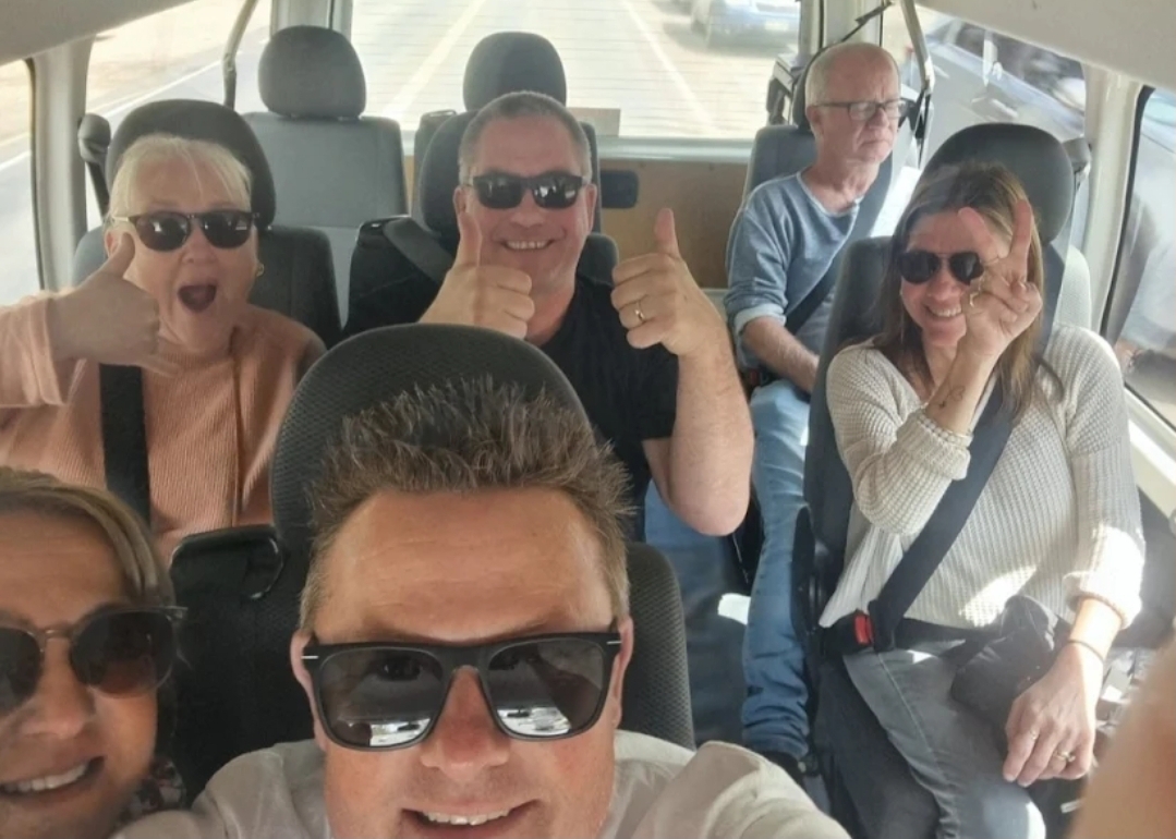 Happy group being transported to Adelaide Oval event