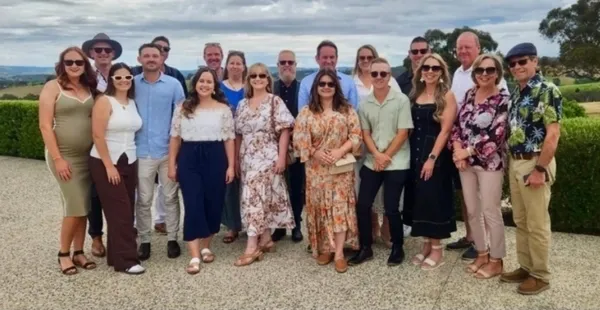 Group enjoying wine tour experience in comfortable minibus