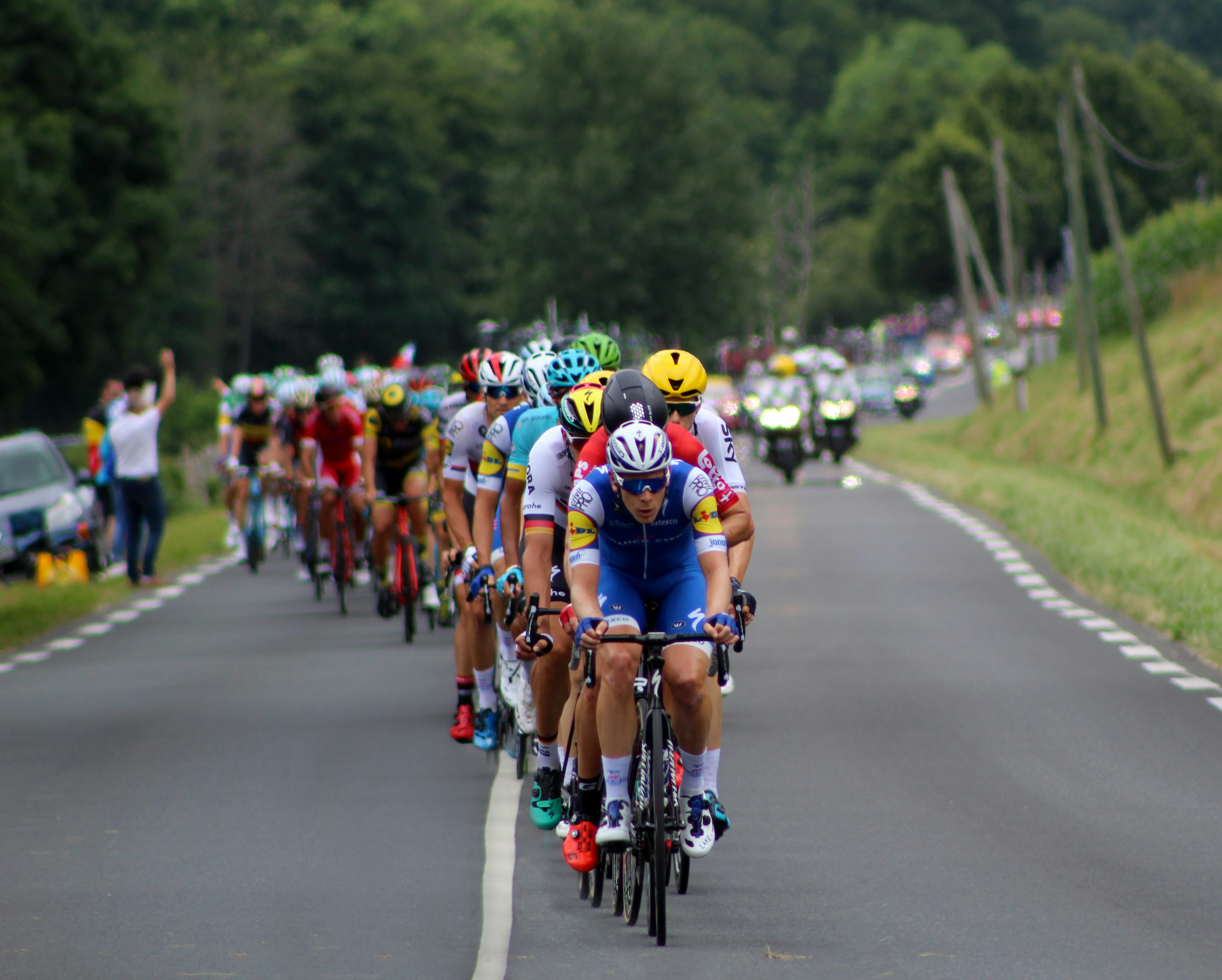 Tour Down Under 2026 peloton cycling through Barossa Valley - transport and wine tours